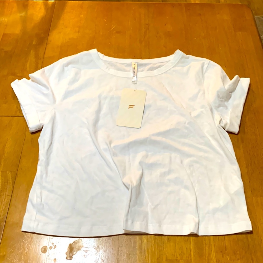 Fabletics BAby white tee size large fitted  Cropped fit NWT